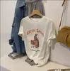 Camiseta de Manga Corta con Estampado de Dibujos Animados Retro Reductora de Edad, Sabor de Hong Kong Estilo Americano para Mujer, Nuevo Modelo de Verano, Algodón Puro, Corte Holgado, Top Versátil, Moderno