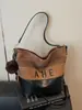 Bolsa Balde Fosca de Grande Capacidade Retrô para Mulheres Nova Moda Outono e Inverno 2025 com Listras Bolsa de Ombro Transversal para Mulheres