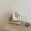 Bolso de mano de alta gama con estampado de lichi, moderno, casual y versátil para llevar al hombro o cruzado, elegante, fresco, dulce y adecuado para ir al trabajo