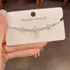 Nuevo de verano, exquisito, moderno, dulce, versátil, pulsera de pétalos gruesa color plata extraíble, accesorio de mano elegante y de lujo ligero