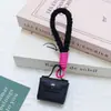 Huayang Bolsa Cuadrada Personalizada de Piel Sintética Mini Mochila Colgante para Llaves Joyería Accesorios Correa para Teléfono Móvil Billetera