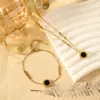 Pulsera Romanesa de Acero de Titanio de Doble Cara con Concha Negra y Blanca para Mujer Venta al por Mayor Moda Simple Joyería de Acero Inoxidable de Gama Alta Suministro Transfronterizo