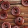 24 nuevas prendas de vestir infantiles de primavera y verano botón color natural material natural fruto de palmera botón de dos ojales camisa coreana para niños