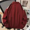 Chaqueta de estilo retro americano de moda con cuello vuelto para hombre, nueva chaqueta deportiva casual holgada de estilo universitario para primavera y otoño con tres rayas