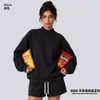 Conjunto de ropa europea y americana para mujer transfronterizo: sudadera casual y shorts, sudadera holgada de forro polar color liso, cuello medio alto, estilo 'dopamine hot girl'