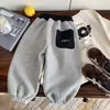 Pantalones de chándal de forro polar de invierno Kino para niños y niñas, estilo coreano, versátiles, pantalones casuales engrosados, ropa infantil de Huzhou Zhili, pantalones largos para niños