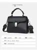 Bolso de mano simple de cuero genuino para mujer, bolso de hombro negro versátil para el día a día, hecho a medida para suministro directo transfronterizo