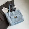 Moda Casual Bolso de Mano Casual para Viajes Cotidianos Gran Capacidad Moda Estilo Coreano Para Mujer Verano 2025 Nuevo Bolso de Hombro de Mariposa
