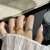 Anillo de plata de ley S925 con forma de lazo y circonita cúbica rosa, un diseño elegante y minimalista para mujer, ajustable para adaptarse al dedo índice, novedad