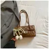 Bolso acolchado para debajo del brazo Shuai Mi Jia para mujer, nuevo modelo de verano, alto valor estético, bolso pequeño cuadrado para el día a día, moderno y a la moda