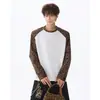 Camiseta de manga longa com patchwork camuflado estilo americano para homens, coleção de outono, design de nicho, ombros com caimento regular, gola redonda, adequada como camada interna ou camiseta básica