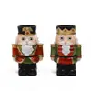 Conjunto de Castiçal Quebra-Nozes Decoração de Natal Estilosa em Resina para Sala de Estar Decoração de Casa e Mesa Conjunto de Duas Peças em Vermelho e Verde Perfeito para Ocasiões Festivas e de Feriado