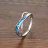 Anillo de cruz de platino ópalo moda transfronteriza de Amazon elegante estilo europeo y americano diseño de nicho joyería versátil al por mayor