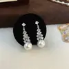 Pendientes Franceses de Lujo Accesible con Perlas Grandes Estilo Nuevo Festivo 2025 Pendientes Elegantes Versátiles de Gama Alta para Mujer
