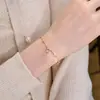 Pulsera Francesa de Alta Gama con Borla de Trébol de Cuatro Hojas y Estrella con Zircón Brillante Lujo Accesible En Flash Pulsera de Diamantes de Alto Carbono para Mujer