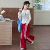 Conjunto de Sudadera para Niñas Primavera y Otoño 2026 Nuevo Dulce Dibujo Animado Parche Pantalón Deportivo Raya Plateada Conjunto Moderno
