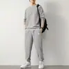 Novo conjunto de moletom em tricô waffle para homens, outono, camiseta de manga comprida cor sólida e calça comprida, esportivo e casual, atacado transfronteiriço
