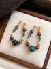 Pendientes de Perlas con Cuentas de Piedra Ojo de Tigre Azul Diseño de Lujo Retro Elegante Accesible Pendientes de Piedra Ojo de Tigre Maillard Otoño e Invierno para Mujer