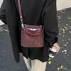Bolso Pequeño Retro de Moda y Sofisticado para Mujer 2025 Nuevo Bolso Cruzado Versátil Bolso de Mano Elegante Bolso Cubo