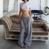 Top corto único estilo europeo y americano transfronterizo INS para mujer, diseño de verano con hebilla metálica ajustable, top ajustado