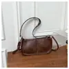 Bolso de mano brillante con brillo metálico para mujer 2026 verano nuevo celebridad de internet de moda bolso de axila de un solo hombro bolso cruzado de moda