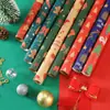 Papel de regalo de Navidad en stock al por mayor transfronterizo superventas nuevo regalo regalo ramo embalaje fabricantes de papel kraft