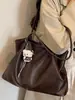 Bolso tote minimalista de nicho Shuai Mi Jia para mujer, nuevo modelo otoño 2026, de gran capacidad, casual, para ir al trabajo, de hombro y debajo del brazo