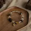 Pulsera de cristal blanco natural con piedra de ojo de tigre, cadena de super siete oro negro, pastillas de agarwood y pulsera Zaki Ram de regalo