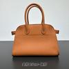 Niche retro high-end sacola Dong Jie Bai Baihe mesmo couro genuíno grande capacidade comutador portátil sacola de ombro