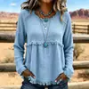Blusa longa de manga comprida, estilo boho europeu e americano, com franjas, textura e amassada, gola redonda, corte solto e ombros caídos.