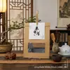 Nueva bolsa de regalo de té estilo chino, bolsa de mano para empaque de té privado, bolsa de té vacía de papel kraft personalizada para regalos de alta gama