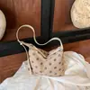 Bolsa de poá de nicho para mulheres, grande capacidade, nova bolsa de ombro transversal retrô de outono de 2026, bolsa tote para o dia a dia Melard