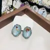 Pendientes Ovalados Elegantes de Gama Alta Estilo Francés Retro con Flores Secas y Goteo de Aceite