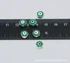 Al por mayor ojo de diablo de cuentas doradas y plateadas 6*8mm cuenta de ojo plana gota de aceite de doble cara agujero recto accesorios de joyería DIY dispersos