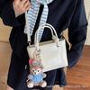 Bolsa Balde Portátil para Mulheres 2025 Nova Moda Estilo Coreano Bolsa Pequena Design de Nicho Casual Roupa de Trabalho Bolsa de Ombro Transversal