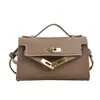 Bolsas Infantis Estilo Coreano 2026 Nova Moda Bolsa de Mão para Meninas Bolsa Kelly Bolsa Transversal Simples Versátil para Menininhas Tendência