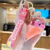 Colgante de arena movediza de cristal flor rosa aceite flotante llavero de coche colgante para mochila escolar de niña regalos de vacaciones