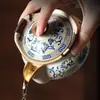 Juego de Té de Viaje Portátil para Exteriores Horno Ru con una Tetera y Dos Tazas Tetera Cerámica de Mano Taza de Té Portátil