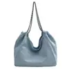 Bolsa de Mezclilla de Gran Capacidad para Mujer Ligera Nueva Verano 2024 Estudiante Universitaria Clase Bolso de Hombro Único Bolso Tote de Cadena