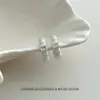 Pendientes de estilo indiferente con textura de circón incrustado en forma de C Pendientes franceses de lujo ligero, sensación simple de alta gama, diseño de nicho, pendientes versátiles para el trabajo
