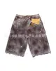 Marca de Tendencia para Hombres y Mujeres 2026 Nuevos Shorts de Mezclilla Rasgados Deshilachados de Verano Pierna Recta Versátiles High Street Retro