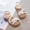 Sapatilhas Femininas 2026 Verão Novo Estilo Coreano Vazado Respirável Sandálias Baixas Sapatos de Praia com Laço de Cristal para Crianças