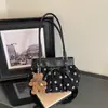 Nuevo bolso de hombro plisado de lunares estilo coreano de nicho transfronterizo, bolso de hombro casual para el día a día, bolso de axila exquisito y moderno
