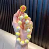 Llavero de cadena para teléfono con lazo de cuentas, colgante de cadena de cuentas de colores para bolso, decoración de funda de teléfono, pequeño regalo para máquina expendedora de juguetes