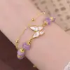 Pulsera de mariposa de amatista sintética para mujer, diseño de nicho de lujo ligero ins, nuevo brazalete de cristal de alta gama, regalo para novias