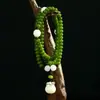 Cadena de mano de raíz de Bodhi de jade blanco natural para hombres y mujeres, vintage, con borla de loto, colgante para coche, joyería Wenwan