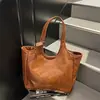Bestseller de comércio exterior transfronteiriço: bolsa de axila para o dia a dia, moderna, de grande capacidade, com um design versátil, de alta qualidade e fashion, adequada para uso na mão e no ombro