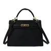 Bolso bandolera de hombro retro de lujo ligero para mujer, moda 2026, nuevo bolso cuadrado tipo Kelly coreano, simple