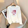 Bestseller de Almacén Lightning Marca de Moda Camiseta de Manga Larga para Mujer 2026 Otoño Invierno Holgada Gato Versátil Top de Pareja Transfronterizo Comercio Exterior