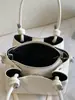 Bolso de cubo de mano minimalista de nicho Shuai Mi Jia 2026 verano nuevo estilo coreano moderno y a la moda bolso de hombro cruzado